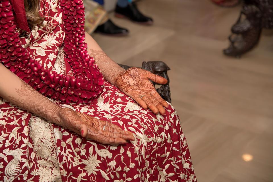 At my Indian wedding, wearing the red gara.