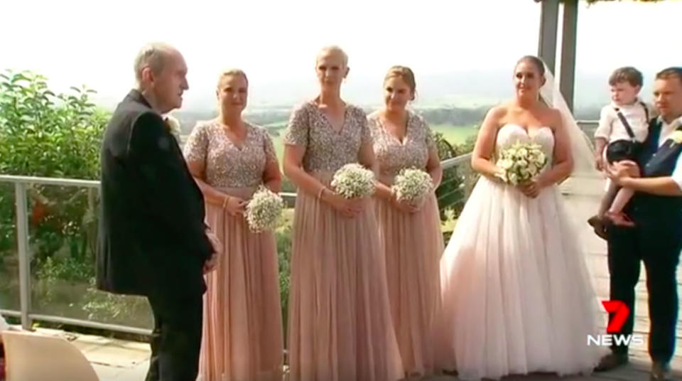 Kevin Wright, left, with his daughter and wedding party. Source: 7News