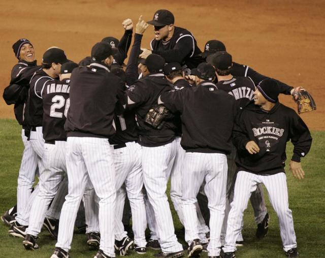 Colorado Rockies left fielder Matt Holliday celebrates after the National  League wild card tiebreaker game against the San Diego Padres at Coors  Field in Denver on October 1, 2007. Holliday scored the