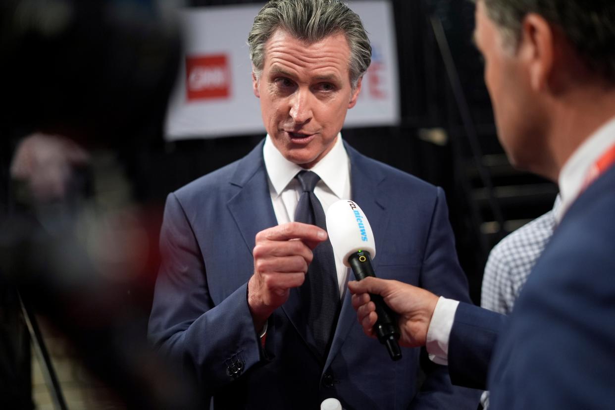 California Gov Gavin Newsom speaks during an interview in the spin room in support of President Joe Biden (AP)