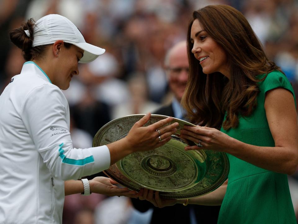 Kate Middleton gives Australian tennis player Ashleigh Barty  the trophy at the Wimbledon women's final.