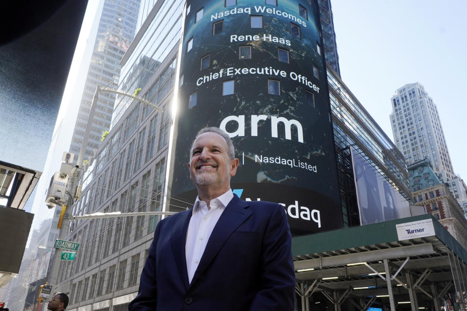 ARM Holdings CEO Rene Haas, poses for photos outside the Nasdaq MarketSite, during his company's IPO, in New York's Times Square, Thursday, Sept. 14, 2023. (AP Photo/Richard Drew)