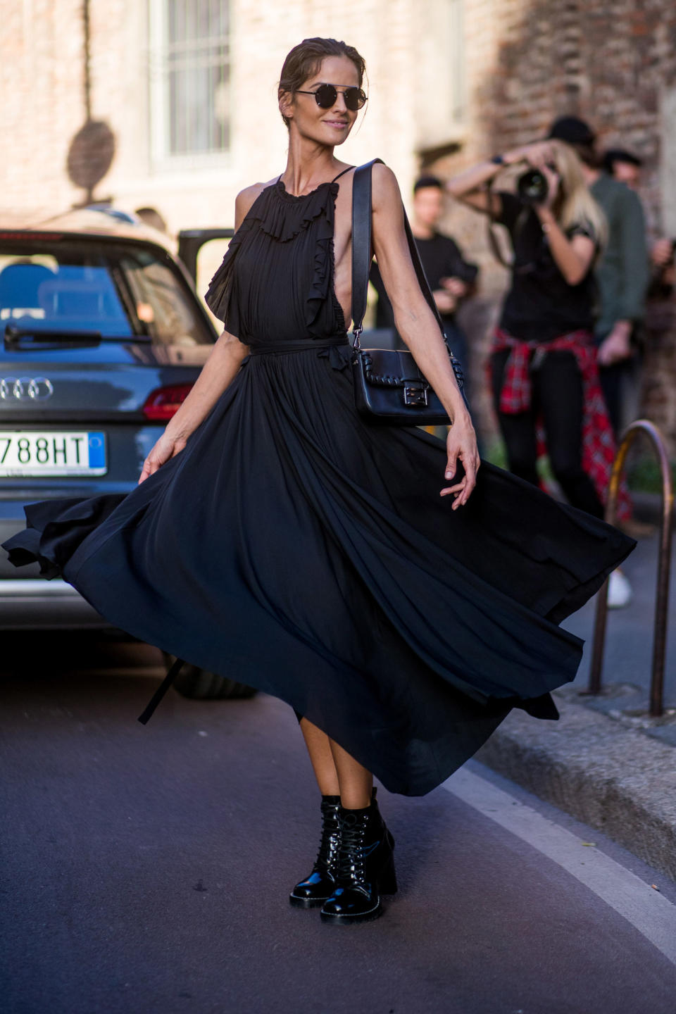 <p>Add some edge to a black summer dress by teaming with heavy-duty boots.</p>