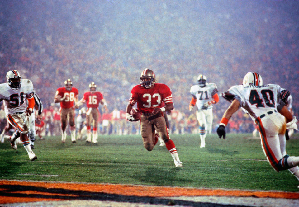 San Francisco 49ers running back Roger Craig (33) scores his third touchdown of the game during Super Bowl XIX against the <a class="link " href="https://sports.yahoo.com/nfl/teams/miami/" data-i13n="sec:content-canvas;subsec:anchor_text;elm:context_link" data-ylk="slk:Miami Dolphins;sec:content-canvas;subsec:anchor_text;elm:context_link;itc:0">Miami Dolphins</a> at Stanford Stadium. The 49ers defeated the Dolphins 38-16. Tony Tomsic-USA TODAY Sports