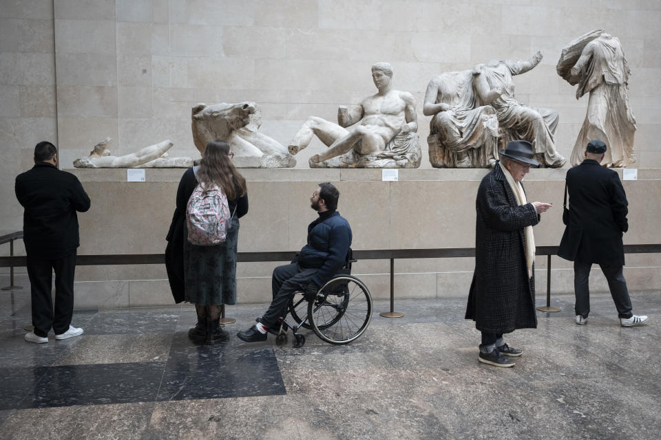 Visitors in the Parthenon Galleries in London's British Museum where visitors admire the Ancient Greek Parthenon Metopes also knows as the Parthenon Marbles aka Elgin Marbles, on 28th November 2023, in London, England. Ninety-two metopes were rectangular marble slabs placed over the columns of the Athens Parthenon temple depicting scenes from Greek mythology.  (Photo by Richard Baker / In Pictures via Getty Images)