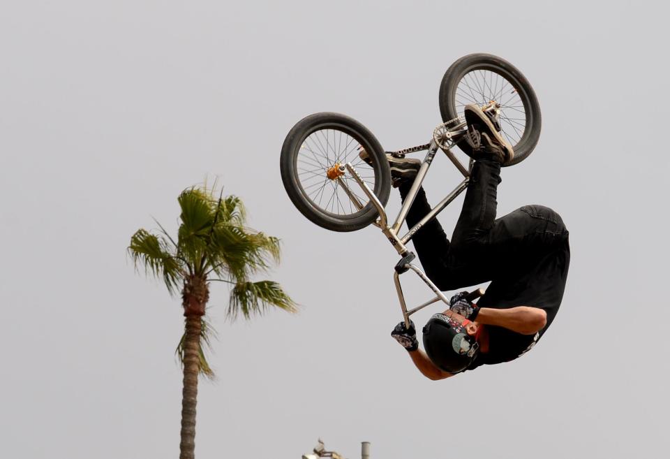 Ryan Williams front flips at the 2023 BMX Dirt Elimination at the X Games competition at the Ventura County Fairgrounds on July 21. X Games organizers invited Williams to return to the fairgrounds in June for the 2024 Ventura X Games.