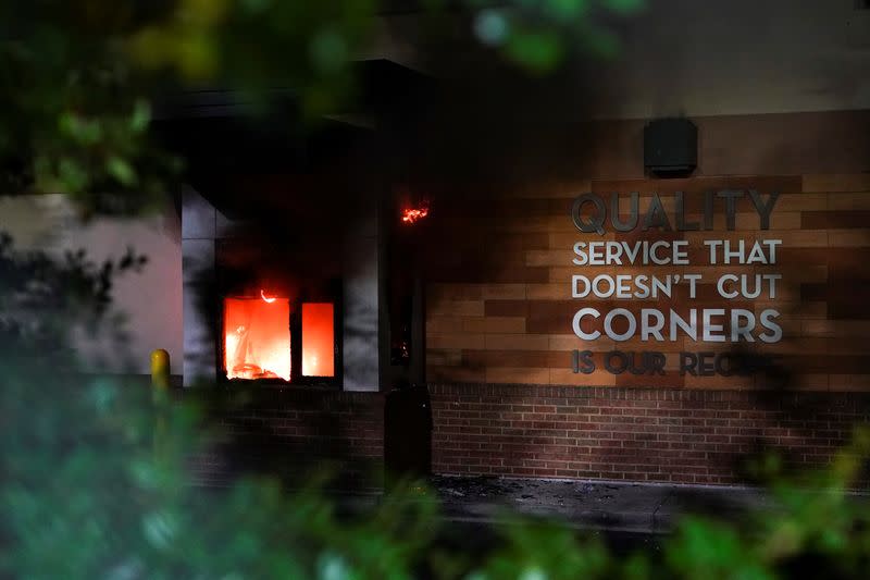 A Wendy’s burns following a rally against racial inequality and the police shooting death of Rayshard Brooks, in Atlanta