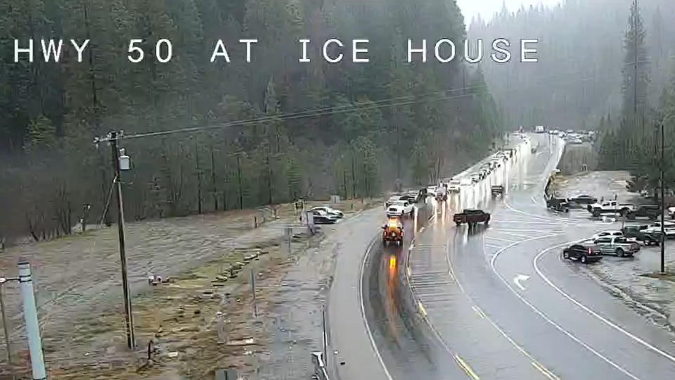 This traffic video image released by Caltrans District 3 shows Highway 50 is closed from Ice House Road to Meyers in El Dorado County, Calif., due to flooding, Saturday, Dec. 31, 2022. A flood watch is in effect across much of Northern California through New Year's Eve. Officials warned that rivers and streams could overflow and urged residents to get sandbags ready. (Caltrans District 3 via AP)