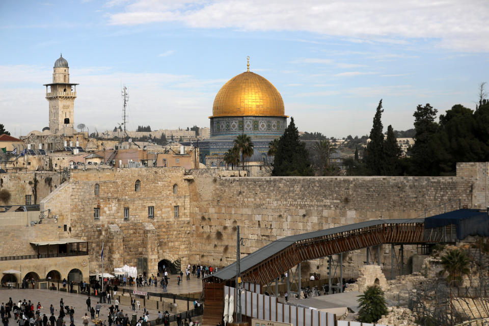 A general view of Jerusalem's Old City shows the Western Wall, Judaism's holiest prayer site, in the foreground as the Dome of the Rock, located on the compound known to Muslims as Noble Sanctuary and to Jews as Temple Mount, is seen in the background December 10, 2017. Picture taken December 10, 2017. REUTERS/Ammar Awad