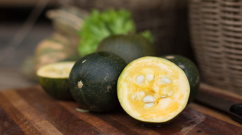 Halved green gem squash