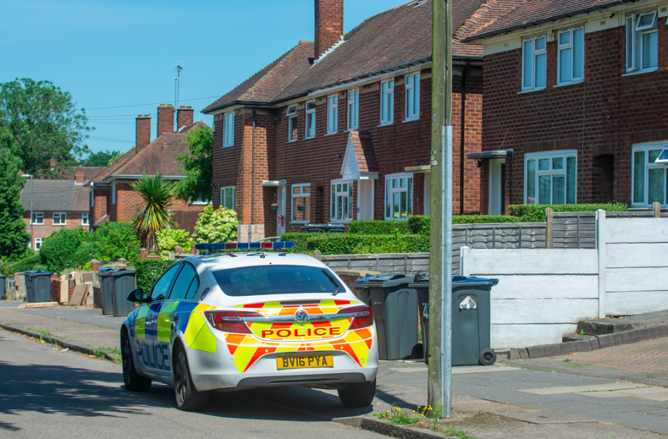 Police visit Louise Lawford's house in Birmingham (SWNS)