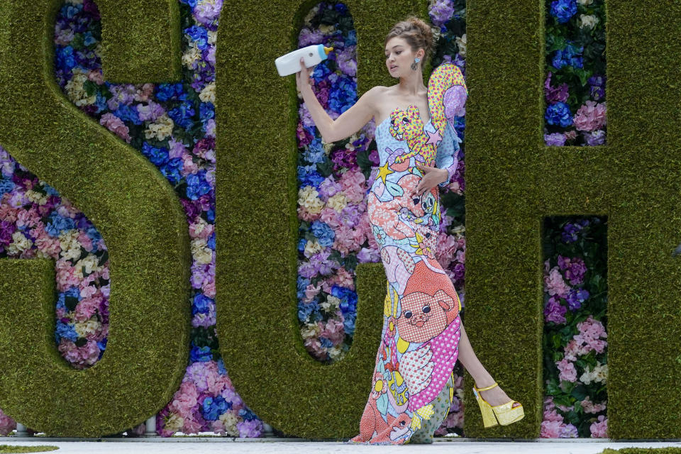 The Moschino collection is modeled during New York Fashion Week, Thursday, Sept. 9, 2021. (AP Photo/Mary Altaffer)