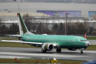 FILE - In this Dec. 11, 2019, file photo, a Boeing 737 Max being built for Norwegian Air International taxis for a test flight, at Renton Municipal Airport in Renton, Wash. Key senators say the Federal Aviation Administration is stonewalling their attempt to get documents that might explain how the agency approved the Boeing 737 Max, which remains grounded more than a year after two deadly crashes. Senate Commerce Committee Chairman Roger Wicker, a Republican from Mississippi, said Wednesday, June 17, 2020 that the FAA has failed to respond to more than half of his committee’s requests for documents. (AP Photo/Ted S. Warren, File)