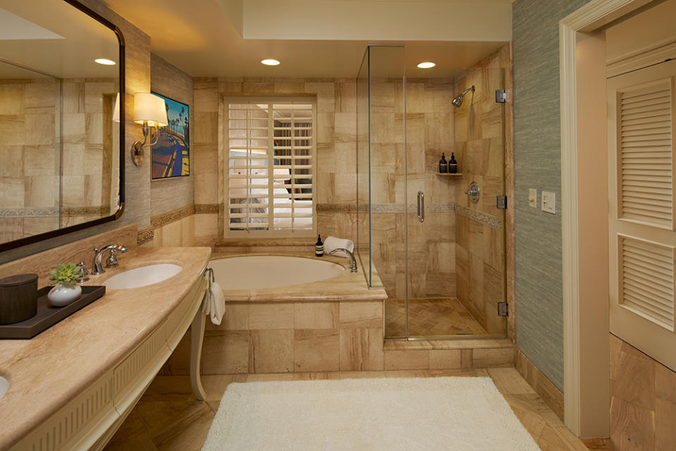Each bathroom comes complete with an oversize bathtub that fits two, plus bubble bath.