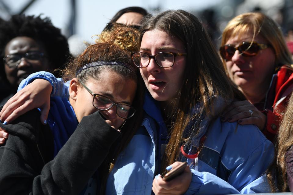 Students react during a speech at the rally.&nbsp;