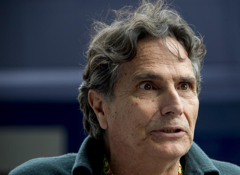 Former F1 Champion Brasil's Nelson Piquet chats at the Red Bull hospitality booth on the eve of the Austrian Formula One Grand Prix at Red Bull ring at Spielberg, Austria on June 18, 2015. AFP PHOTO /JOE KLAMAR (Photo credit should read JOE KLAMAR/AFP via Getty Images)