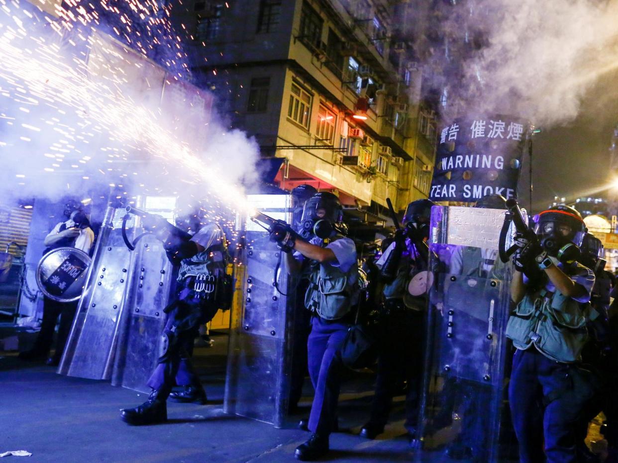 Police fire tear gas at anti-extradition bill protesters during clashes in Sham Shui Po in Hong Kong, 14 August, 2019: REUTERSREUTERS/Thomas Peter