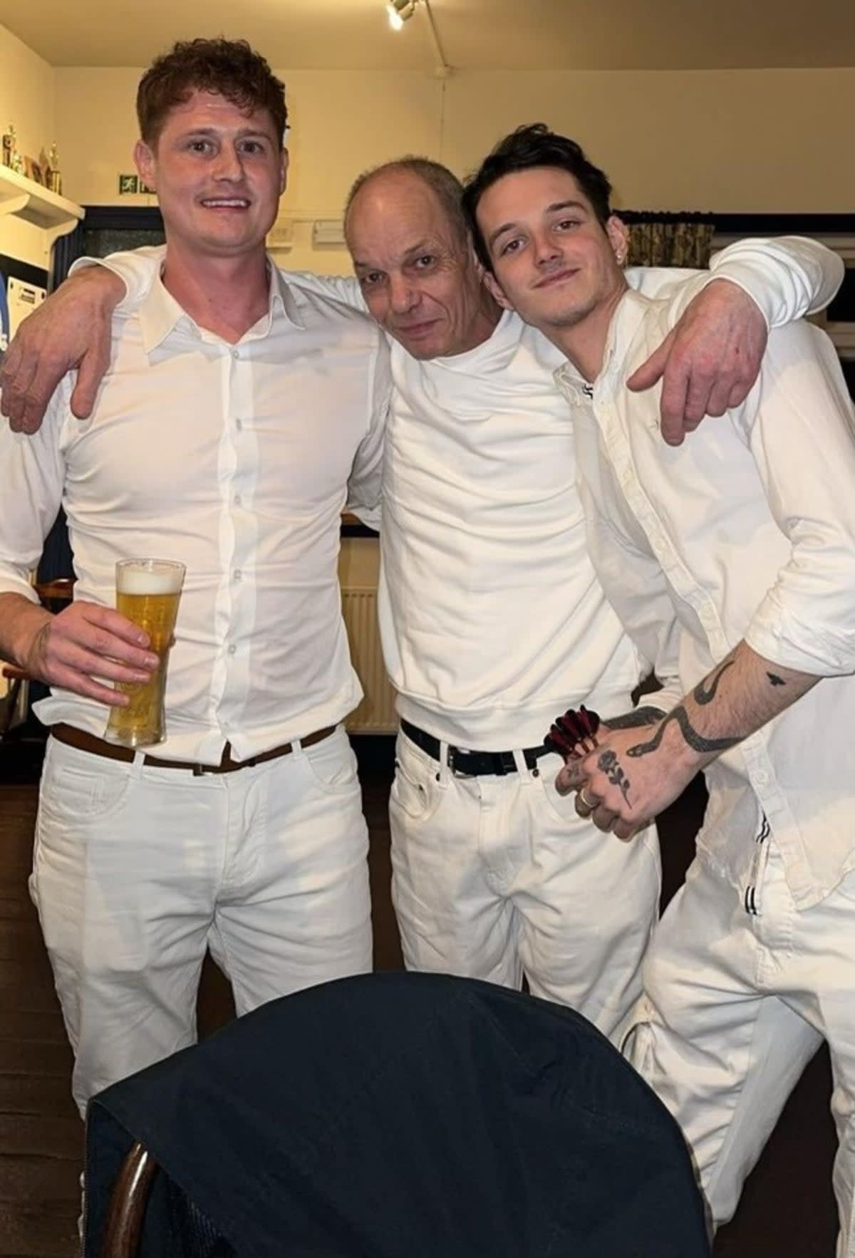 Grandson Connor, 31, Husband Tony, 59 and Grandson Asa, 23, dressed in white in memory of Sharon (Provides)