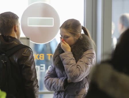 A woman reacts at Pulkovo airport in St. Petersburg, Russia, October 31, 2015. REUTERS/Peter Kovalev