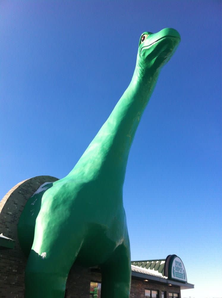 Dinosaur shaped entrance to gas station in Wisconsin.