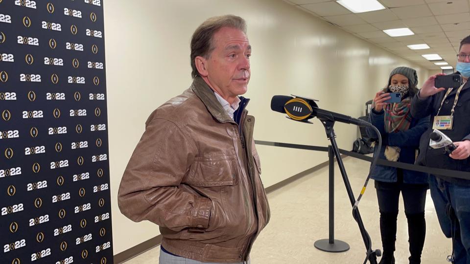 Alabama football coach Nick Saban speaks with reporters Friday after arriving in Indianapolis ahead of the College Football Playoff championship against Georgia.