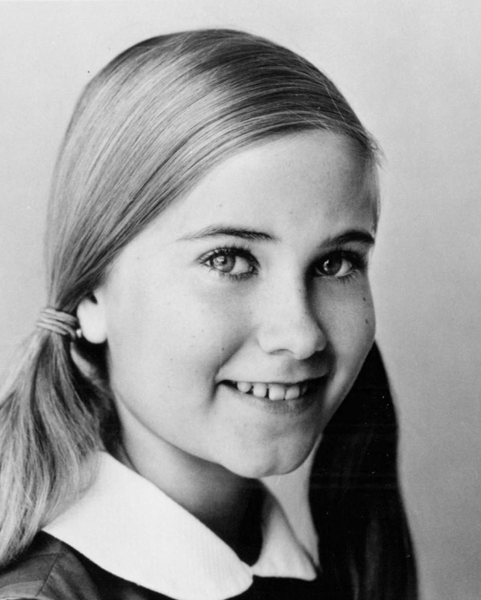 Played by actress Maureen McCormick.