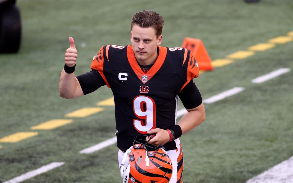 CINCINNATI, OHIO - OCTOBER 04:   Joe Burrow #9 of the Cincinnati Bengals celebrates after the 33-25 win against Jacksonville Jaguars at Paul Brown Stadium on October 04, 2020 in Cincinnati, Ohio. (Photo by Andy Lyons/Getty Images)