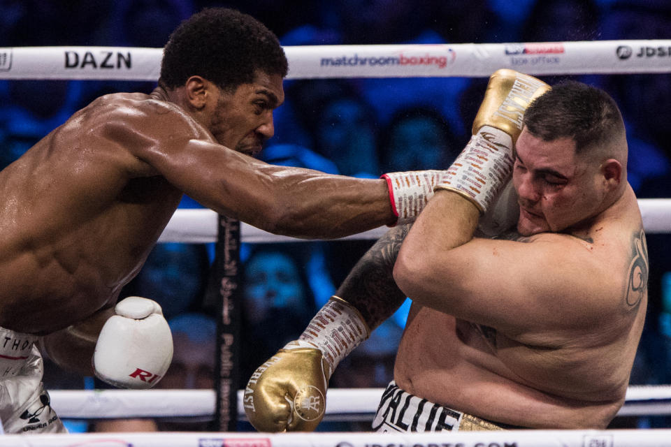 08 December 2019, Saudi Arabia, Diriyah: US-Mexican professional boxer Andy Ruiz Jr (R) in action against Britain's Anthony Joshua during their World Heavyweight Championship contest at the Diriyah Arena. Photo: Oliver Weiken/dpa (Photo by Oliver Weiken/picture alliance via Getty Images)
