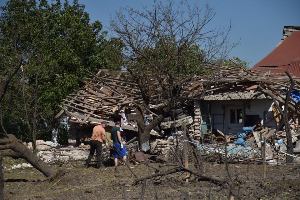 Aftermath of the Russian missile attack in the village of Stavchany (Anadolu Agency via Getty Images)