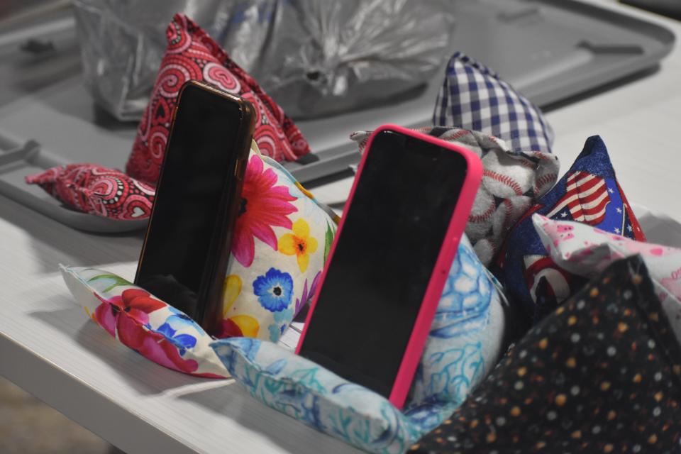 Some of the items made by the class participants will be offered at the spring marketplace. Here is a photo of the phone stands made by the club participants.