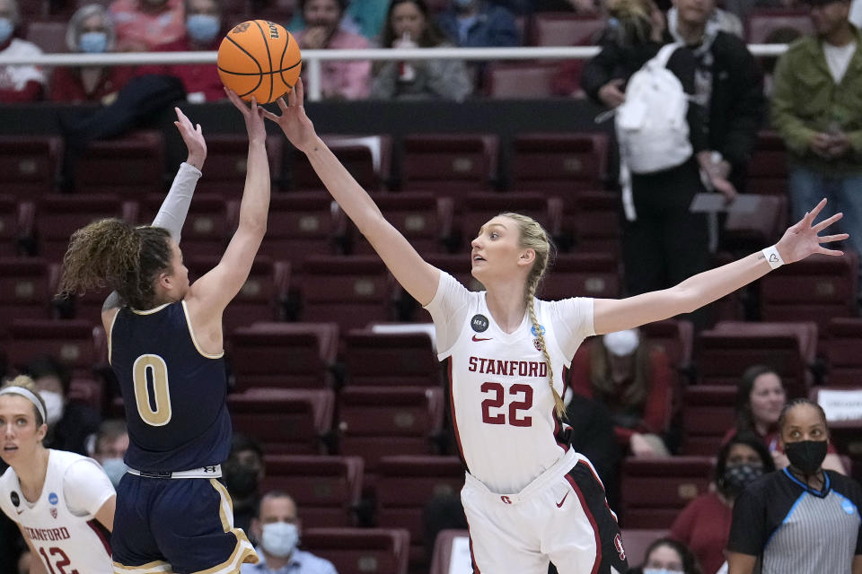 Stanford forward Cameron Brink (22) blocks a shot by Montana State guard Darian White (0) during the first half of a first-round game in the NCAA women's college basketball tournament Friday, March 18, 2022, in Stanford, Calif. (AP Photo/Tony Avelar)