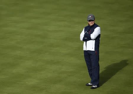 U.S. Ryder Cup captain Tom Watson smiles as he stands on the 15th green during practice ahead of the 2014 Ryder Cup at Gleneagles in Scotland September 24, 2014. REUTERS/Phil Noble