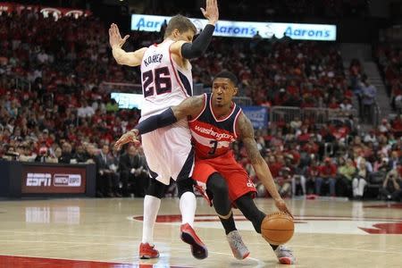 May 3, 2015; Atlanta, GA, USA; Washington Wizards guard Bradley Beal (3) drives past Atlanta Hawks guard Kyle Korver (26) in the second quarter in game one of the second round of the NBA Playoffs. at Philips Arena. Mandatory Credit: Brett Davis-USA TODAY