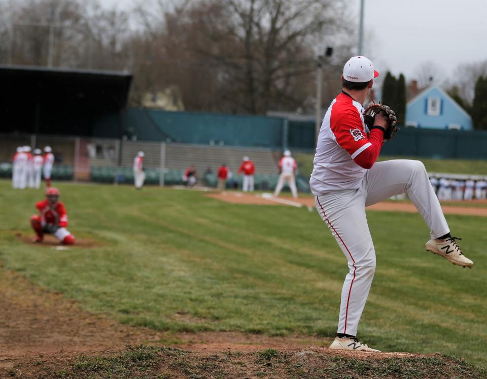 Richmond senior Hayden Scalf winds up for a warmup pitch before a game against Centerville April 7, 2022.