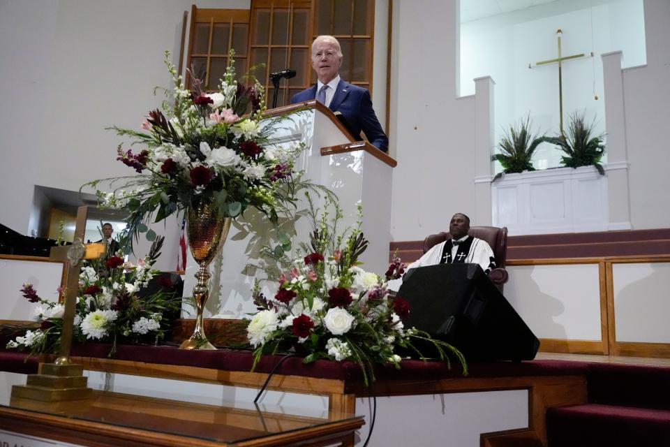 President Joe Biden speaks as Reverend Dr. Jamey O. Graham Sr. looks on at right at St. John Baptist Church, in Columbia, S.C., on Sunday, Jan. 28, 2024. (AP Photo/Jacquelyn Martin)