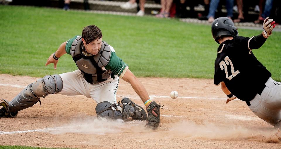 Hendricken catcher Brandyn Durand tries to make a play at home during a game last season. Last week, Durand announced he will be playing at Chipola College rather than Kentucky next season.