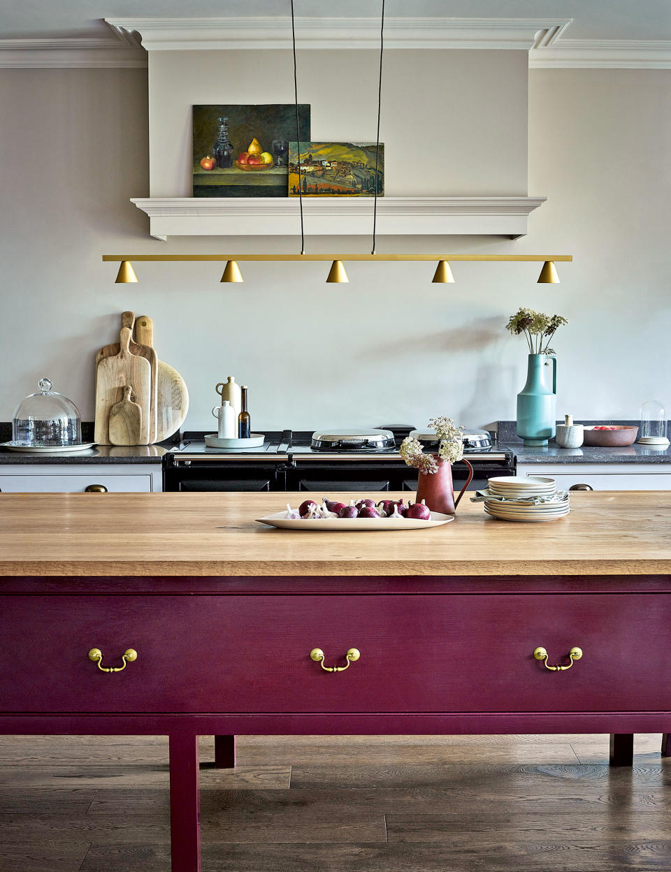 7. Liven-up a neutral kitchen with a purple island