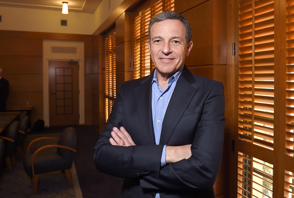 FILE - In this Thursday, Dec. 10, 2015, file photo, Bob Iger, chairman and CEO of The Walt Disney Company, poses in a conference room before speaking to members of the media about bringing NFL football back to the Los Angeles area, in Burbank, Calif. On Thursday, March 23, 2017, The Walt Disney Co. announced that Iger is getting a one-year contract extension, to July 2, 2019.  (AP Photo/Mark J. Terrill, File)