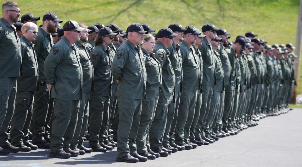 More than 100 Ohio corrections officers stand outside the funeral for Lt. Rodney Osborne on Monday at the Cornerstone Nazarene Church in Wheelersburg, Scioto County. Osborne was fatally shot in the chest on April 9 at the firing range at the Ohio Department of Rehabilitation and Correction's prison training facility in Orient, Pickaway County. The Ohio State Highway Patrol is investigating the shooting.