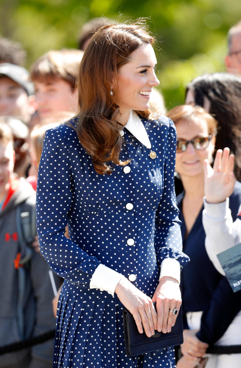 In May, Kate Middleton wore a stylish blue-and-white polka dot dress to Bletchley Park in England. (Photo: Getty Images)