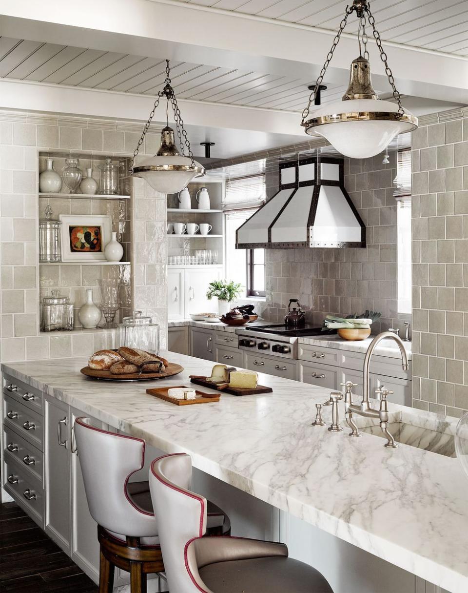 a kitchen with a marble countertop