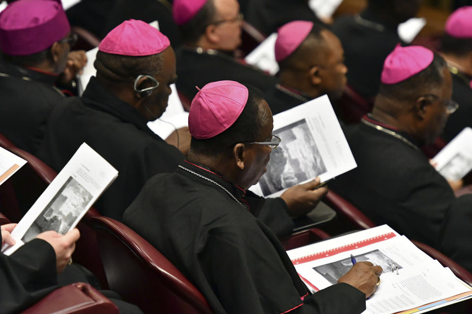 Bishops attend the opening of a sex abuse prevention summit, at the Vatican, Thursday, Feb. 21, 2019. The gathering of church leaders from around the globe is taking place amid intense scrutiny of the Catholic Church's record after new allegations of abuse and cover-up last year sparked a credibility crisis for the hierarchy. (Vincenzo Pinto/Pool Photo via AP)
