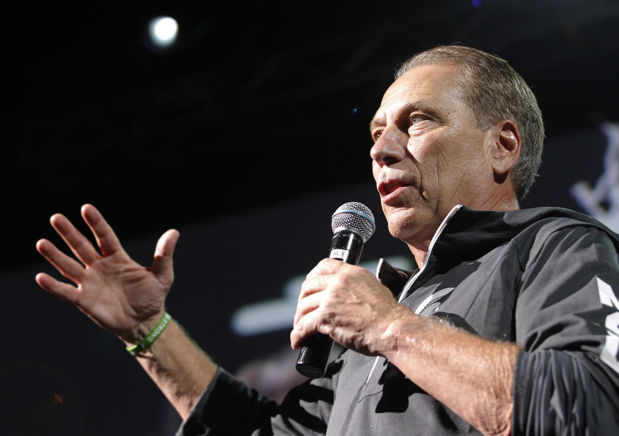 Michigan State coach Tom Izzo addresses the crowd before an NCAA college basketball scrimmage, Friday, Oct. 20, 2017, in East Lansing, Mich. (AP Photo/Al Goldis)