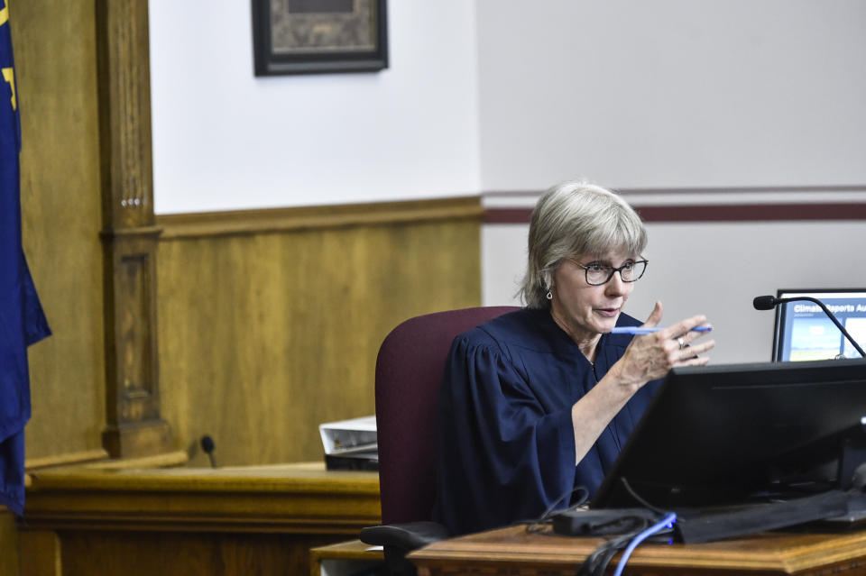 Judge Kathy Seeley presides during Held vs. Montana at the Lewis and Clark County Courthouse, Tuesday, June 13, 2023, in Helena, Mont. The 16 young plaintiffs and their attorneys are trying to persuade a judge that the state’s allegiance to fossil fuel development endangers the young people’s health and livelihoods and those of future generations. (Thom Bridge/Independent Record via AP)