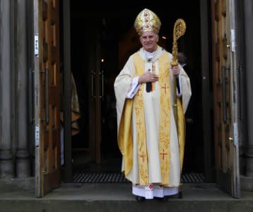 FILE PHOTO: The leader of the Roman Catholic Church in Scotland Cardinal Keith O'Brien is seen leaving after his Easter Sunday homily at St Mary's Cathedral in Edinburgh, Scotland in this April 4, 2010 file photograph.  REUTERS/David Moir/Files