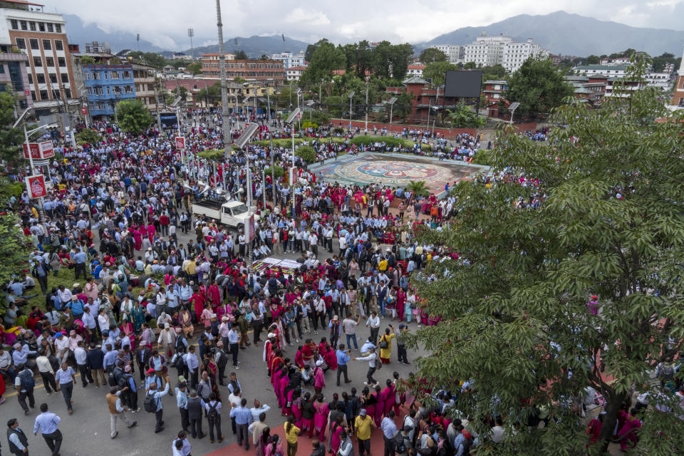 Teachers from across the country gather for a protest against an education bill in Kathmandu, Nepal, Friday, Sept. 22, 2023. Schools for millions of students in Nepal were closed Friday as tens of thousands of teachers protested in the capital against an education reform bill in parliament. The teachers oppose provisions that would shift government-run schools to local control, saying it would lower their status, and that would scrap many temporary teacher positions. (AP Photo/Niranjan Shrestha)