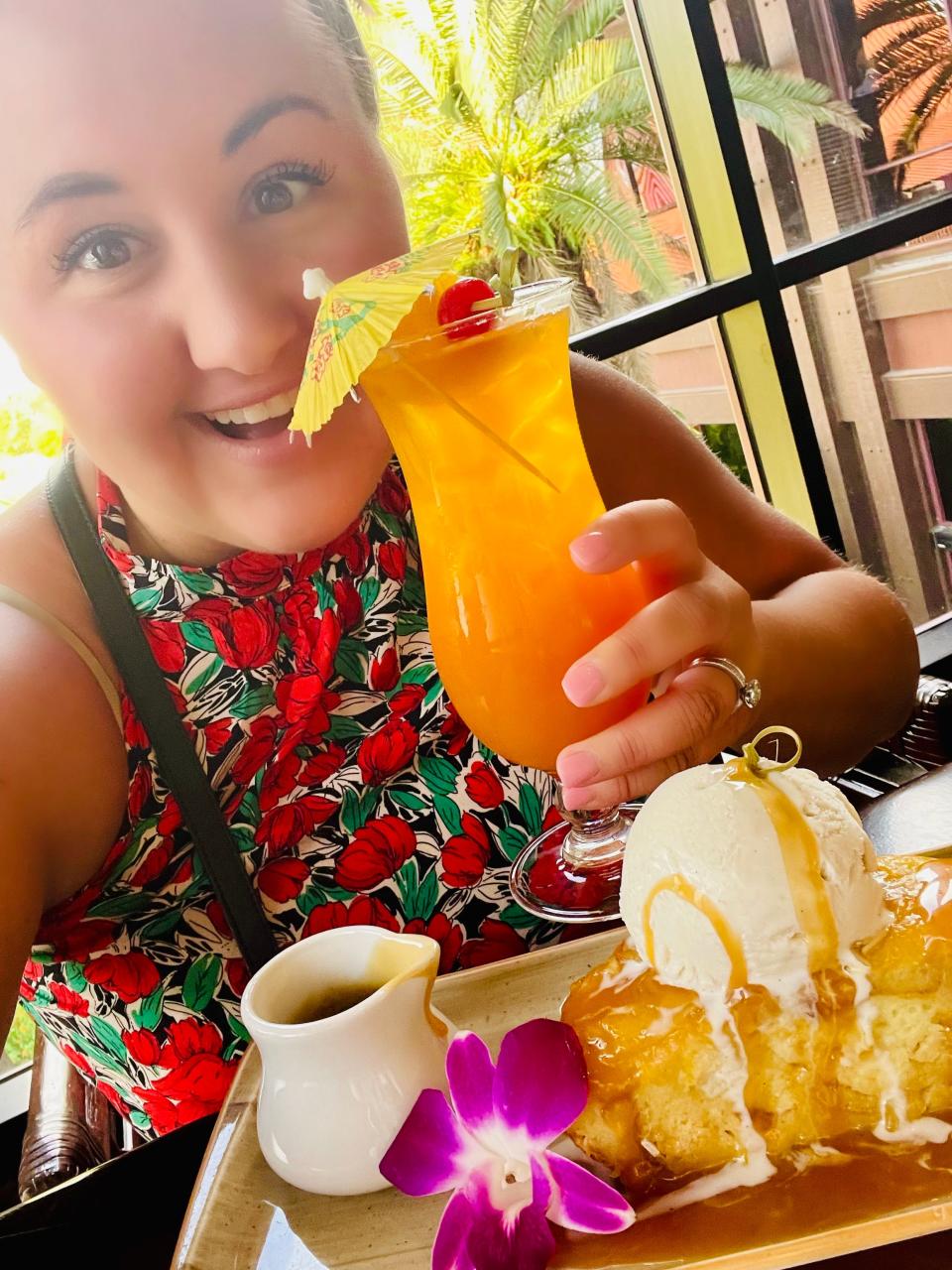 carly eating and drinking at the polynesian resort lounge disney world