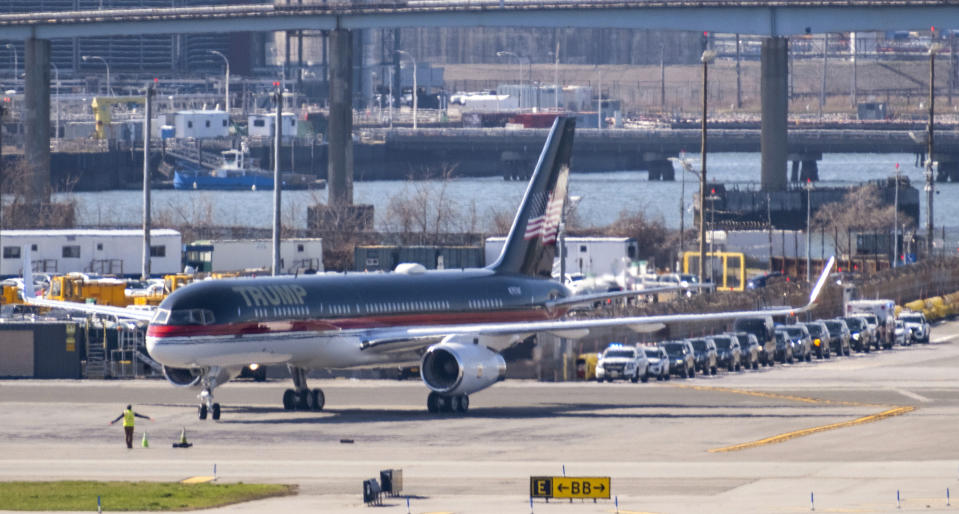 CORRECTS TO 2023, NOT 3023 - An aircraft carrying former President Donald Trump is directed on the runway after arrival at LaGuardia Airport in New York Monday, April 3, 2023. (AP Photo/Craig Ruttle)