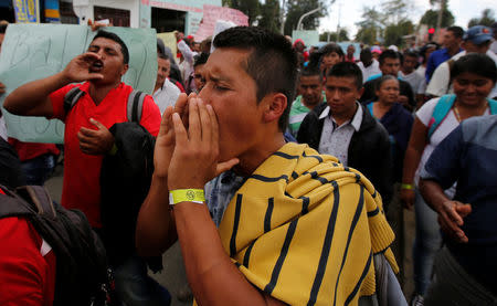 Peasants growing coca, amapola and marijuana march to protest against the government's plan to eradicate illicit crops in Popayan, Colombia, January 28, 2017. REUTERS/Jaime Saldarriaga