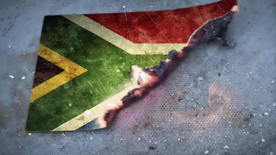 This frame grab taken on Friday, May 10, 2024 from video from a campaign clip for South Africa's opposition Democratic Alliance party shows the country's flag in flames. A campaign video for South Africa’s opposition party showing the country’s flag in flames has stoked tensions just weeks ahead of national elections that are seen as the most pivotal since the end of the apartheid system of racial segregation 30 years ago. (DA via AP)